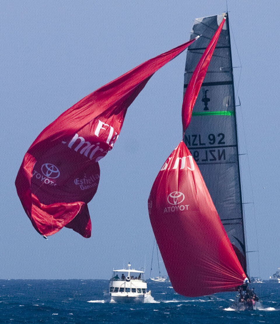 Valencia, 29 06 2007America's Cup Match by Louis VuittonEmirates Team New Zealand vs Alinghi. Emirates Team New Zealand breaks the Spinnaker©ACM 2007/Photo:Guido Trombetta