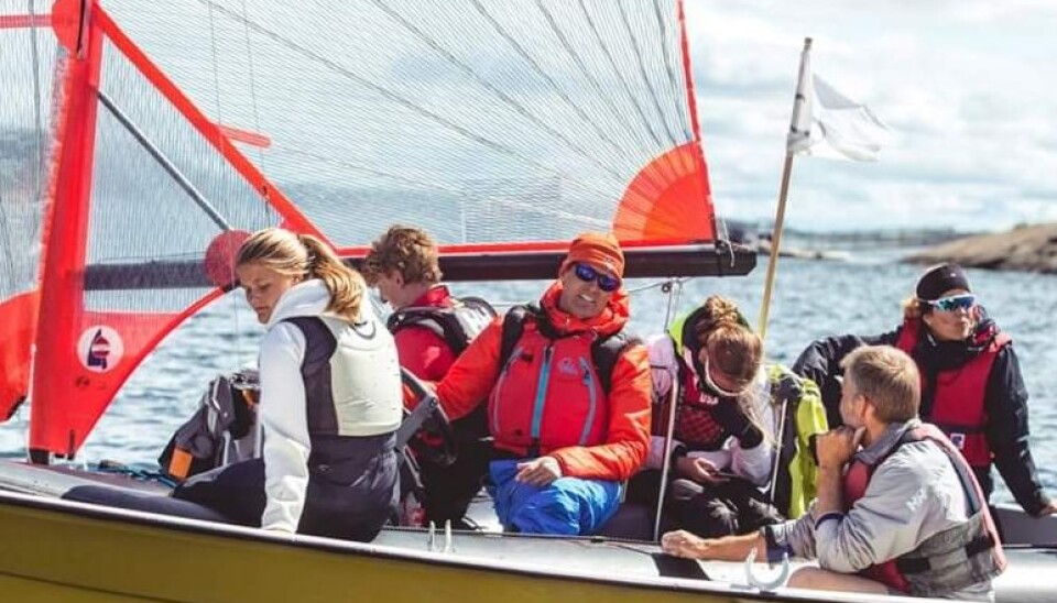 Ole Petter Pollen sammen med glade seilere