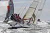 Regattaseilbåter med seil oppe på sjøen under NM 11:mod 2009 i Moss.